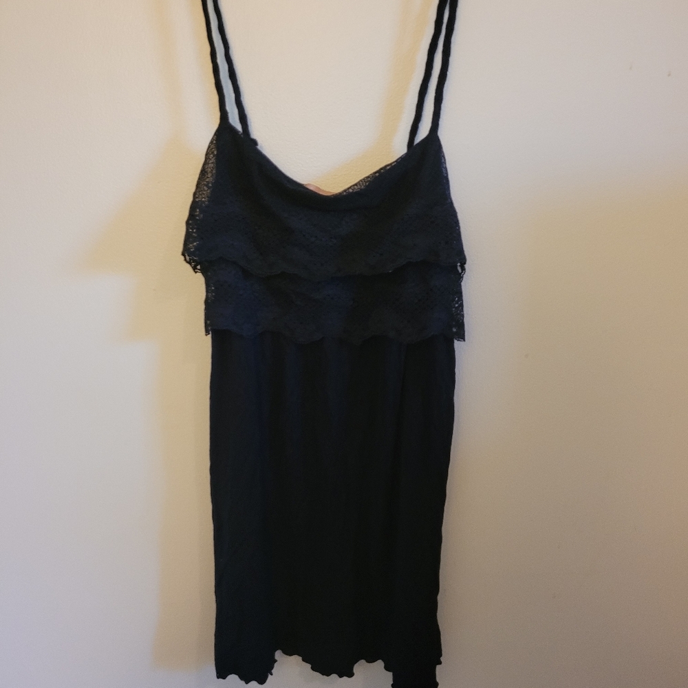 Twenty One Size M Black tank top with tie back waist and lace ruffle top